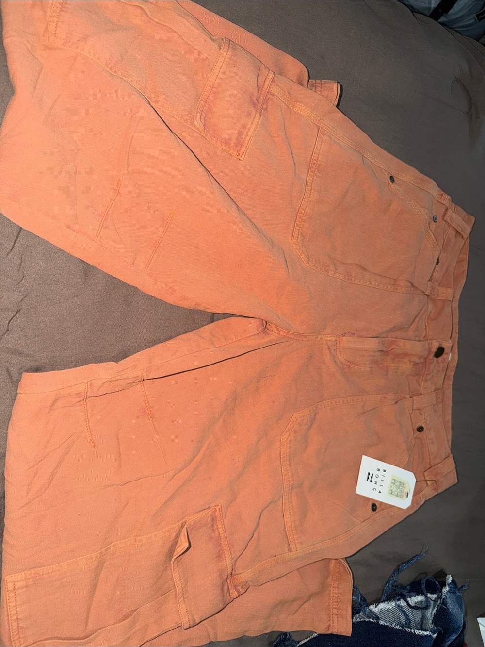 Women Billabong Cargo Work Pants in peach/orange color